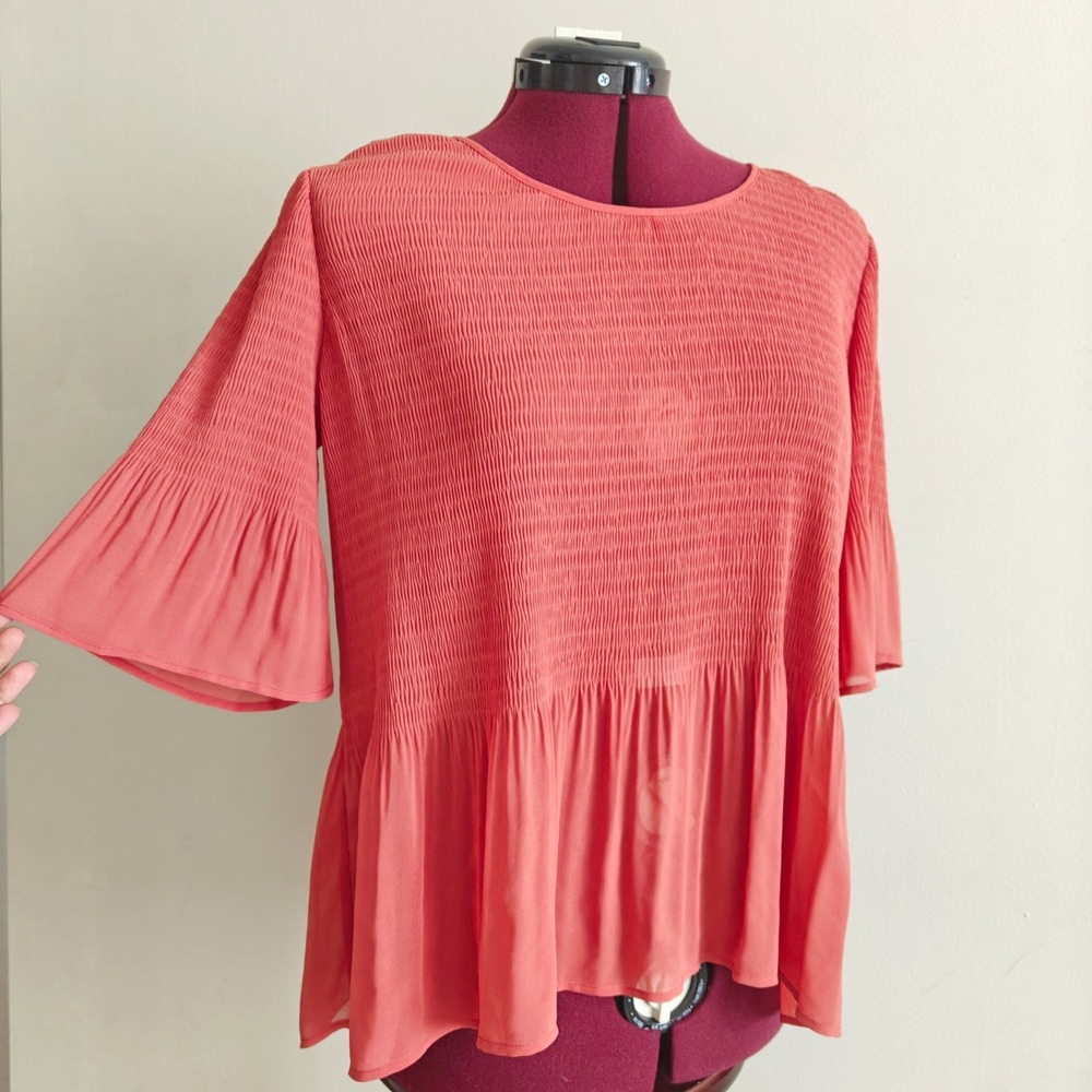 Pleione Womens XS Coral Pink Oversized Smocked Peplum Blouse Bell Sleeve Sheer